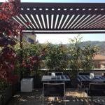 realizzazione di pergola in ferro e area arredo